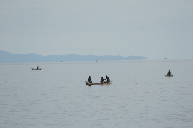 Lake Malawi with dug out canoes